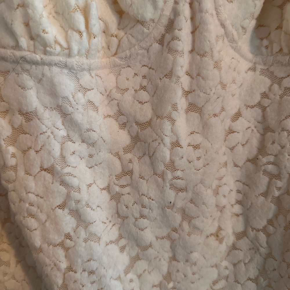 Lace cream colored body suit